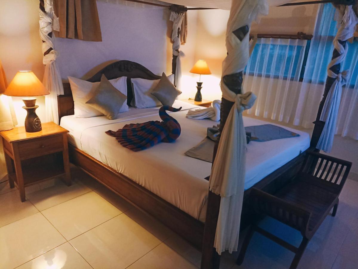 Kusnadi Hotel Легиан Екстериор снимка