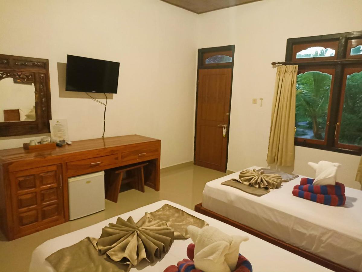 Kusnadi Hotel Легиан Екстериор снимка