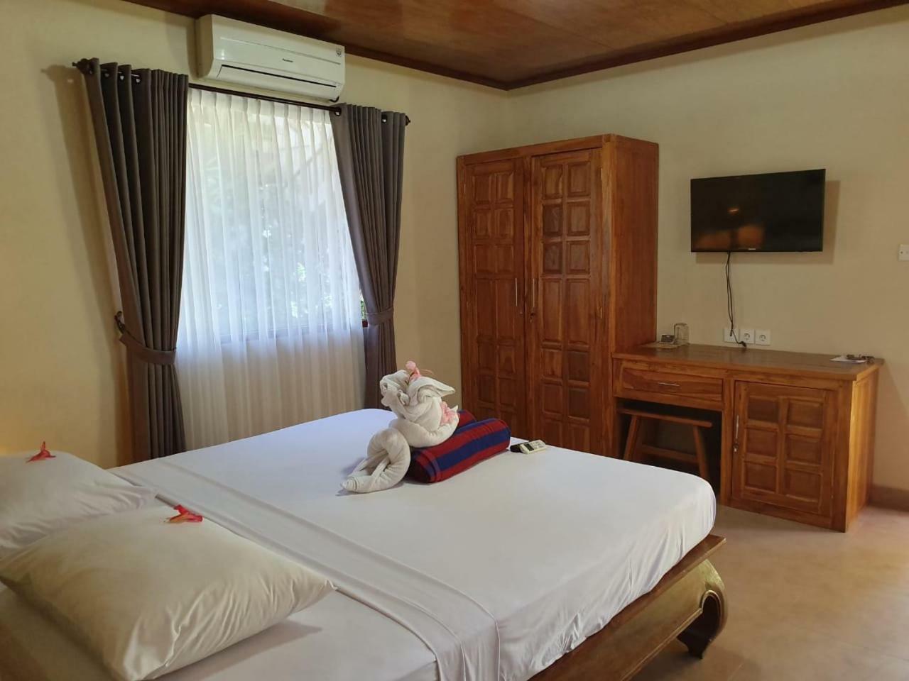 Kusnadi Hotel Легиан Екстериор снимка